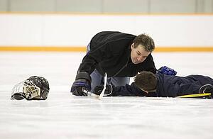 Hockey player down on the ice