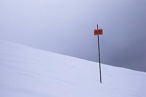 Boundary sign in the snow