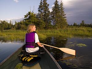 Girl canoeing