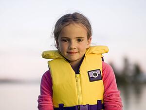 Girl in a personal floatation device