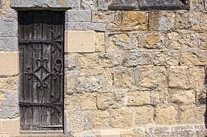 Ornate door, stone wall