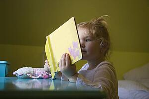 A girl reading a book