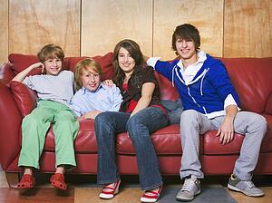 Siblings on a couch
