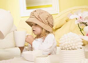 Girl holding mug