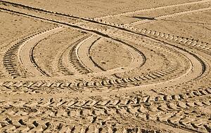 Tire tracks in the sand