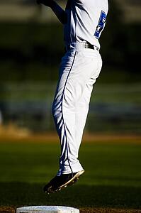 Baseball player jumping