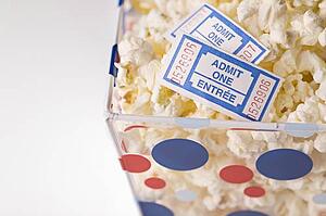 Popcorn bowl with movie tickets 