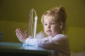 Young girl praying