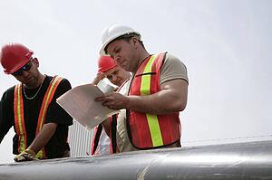 Three construction workers