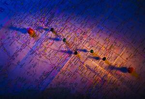 Push pins on a map