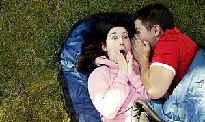 Couple sharing a secret