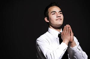 Young man praying