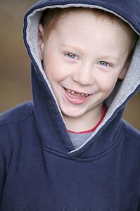 Boy in blue sweater