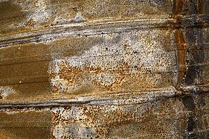 Detail of burned and rusty metal