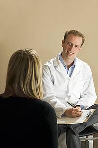 Chiropractor with his patient