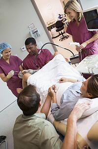 Doctor retrieving eggs from ovary using vaginal ultrasound