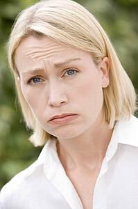 Head shot of sad woman