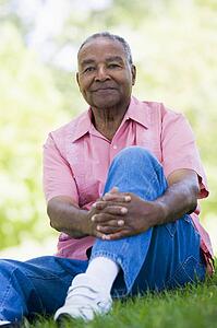 Senior man sitting outdoors