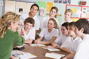 Students receiving a biology lesson in classroom