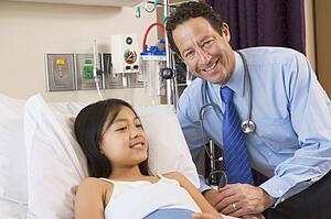 Doctor Checking Up On Girl