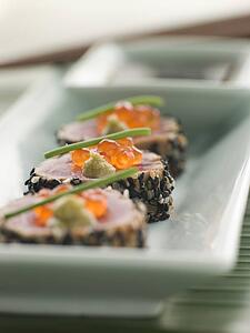 Seared Yellow Fin Tuna Rolled in Sesame seeds with Wasabi and Salmon Roe