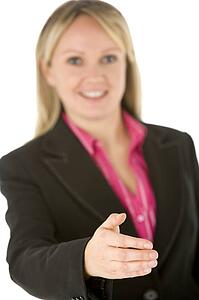 Businesswoman Holding Her Hand Out Ready To Shake