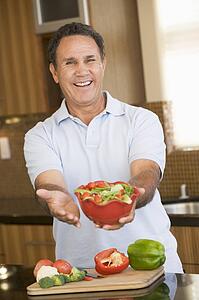 Man Presenting Salad