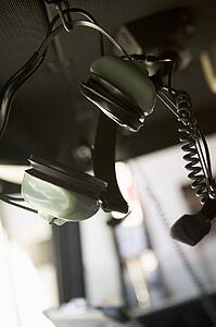 Firefighter's headset hanging in fire engine (selective focus)