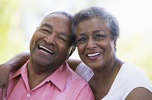 Senior couple sitting outdoors