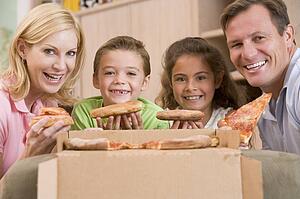 Family Eating Pizza Together 