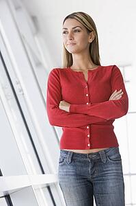 Woman standing in corridor