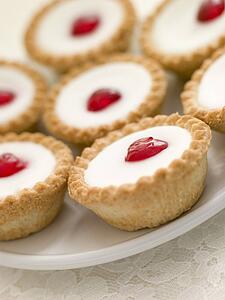 Plate of Cherry Bakewell Tarts