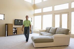 Man walking through living room