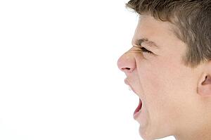 Teenage boy shouting