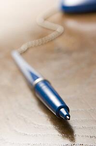 Close Of Up Blue Ballpoint Pen Attached To A Chain