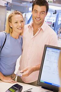 Man paying for purchases with credit card