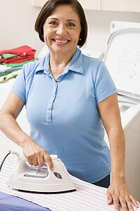 Woman Ironing Shirt