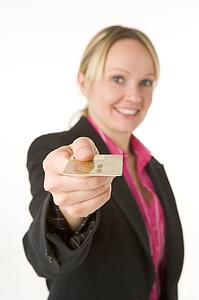 Businesswoman Holding Gold Credit Card