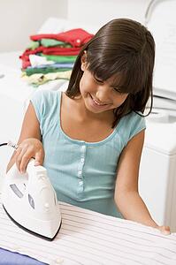 Young Girl Ironing 