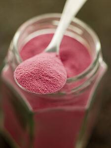 Spoon of Sel Rose on a Glass Jar