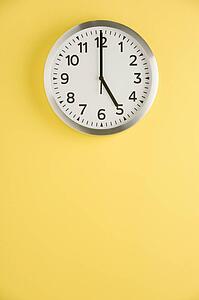 Office Clock Displaying 5 O'clock