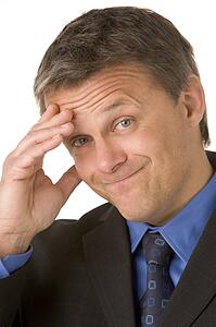 Businessman With A Headache