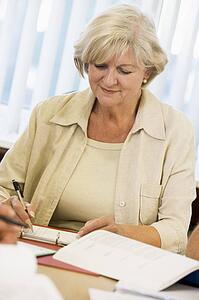 Adult student studying at table