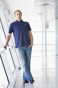 Man standing in corridor