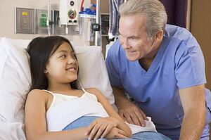 Doctor Checking Up On Patient