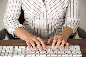 Businesswoman Typing 