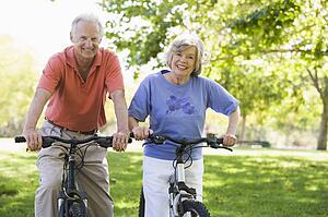 Senior couple on bicycles