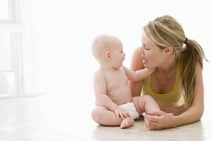 Mother and baby indoors