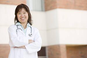 Doctor Standing Outside A Hospital