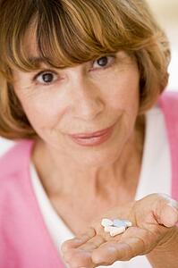 Woman Taking Pills